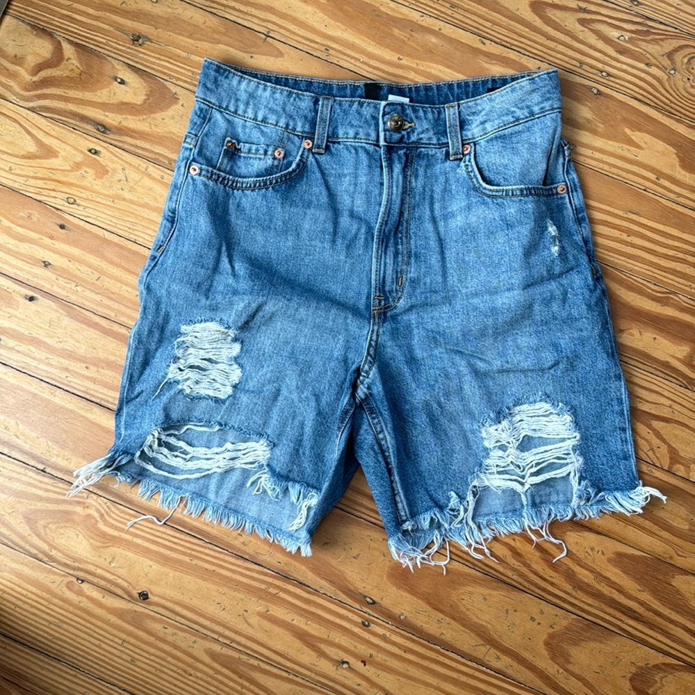 Medium length cut off shorts